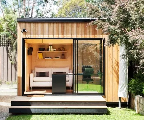 Modern backyard granny flat with timber cladding